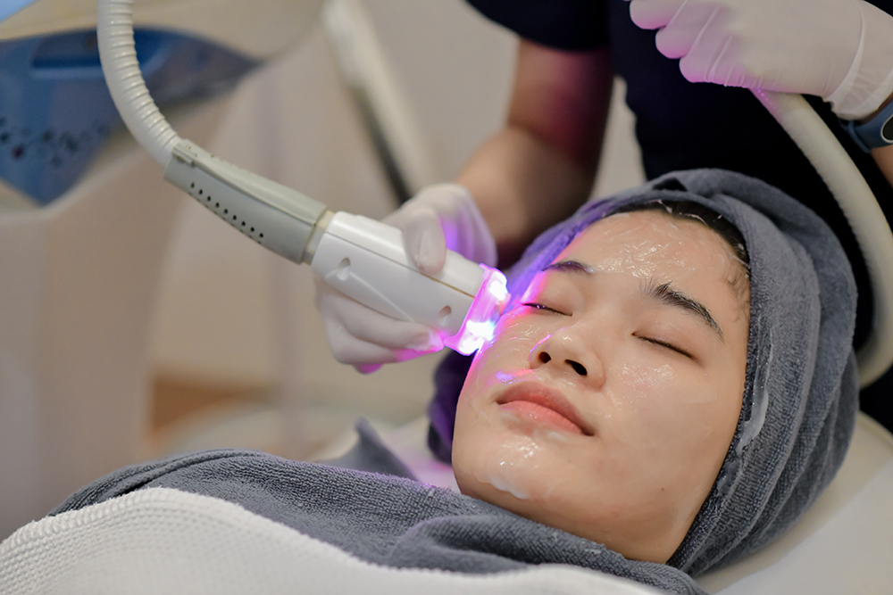 A woman receiving a skin laser treatment.